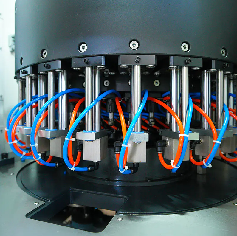 Cap compression molding machine